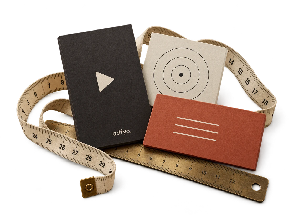 A measuring tape, brass ruler and creative planning cards for a tailored project scope